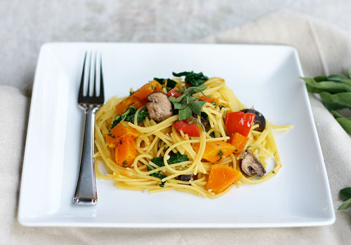 gluten free pasta with butternut squash and kale in a lemon butter sauce